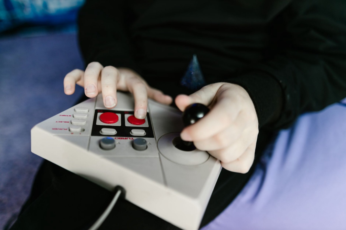 Gaming console parental control interface with 18+ rating sticker